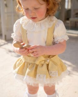 Elegant ivory bodysuit detail