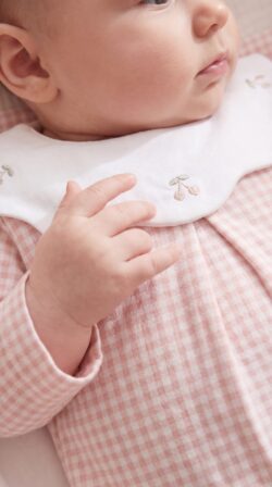 pink cherry babygrow detail